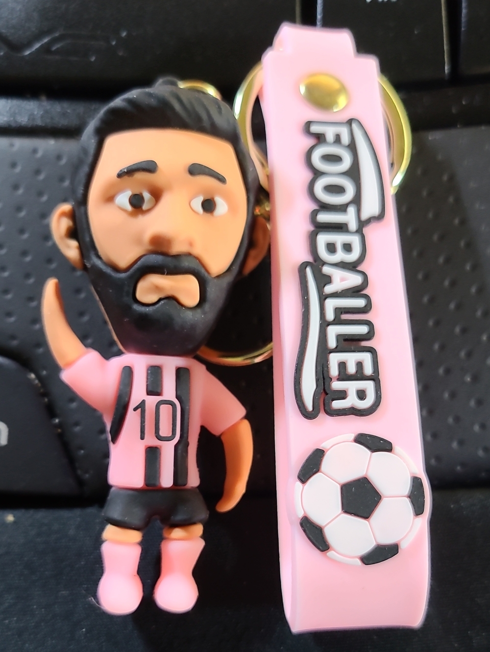 3D rubber Keychain featuring a stylized Lionel Messi
